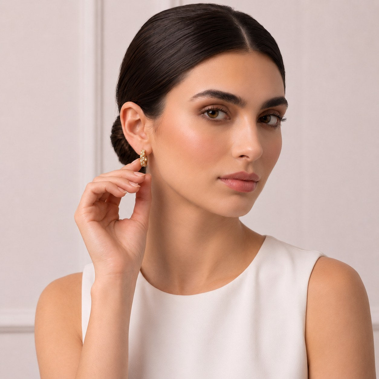 Astria Gold Huggie Earrings Secondary image